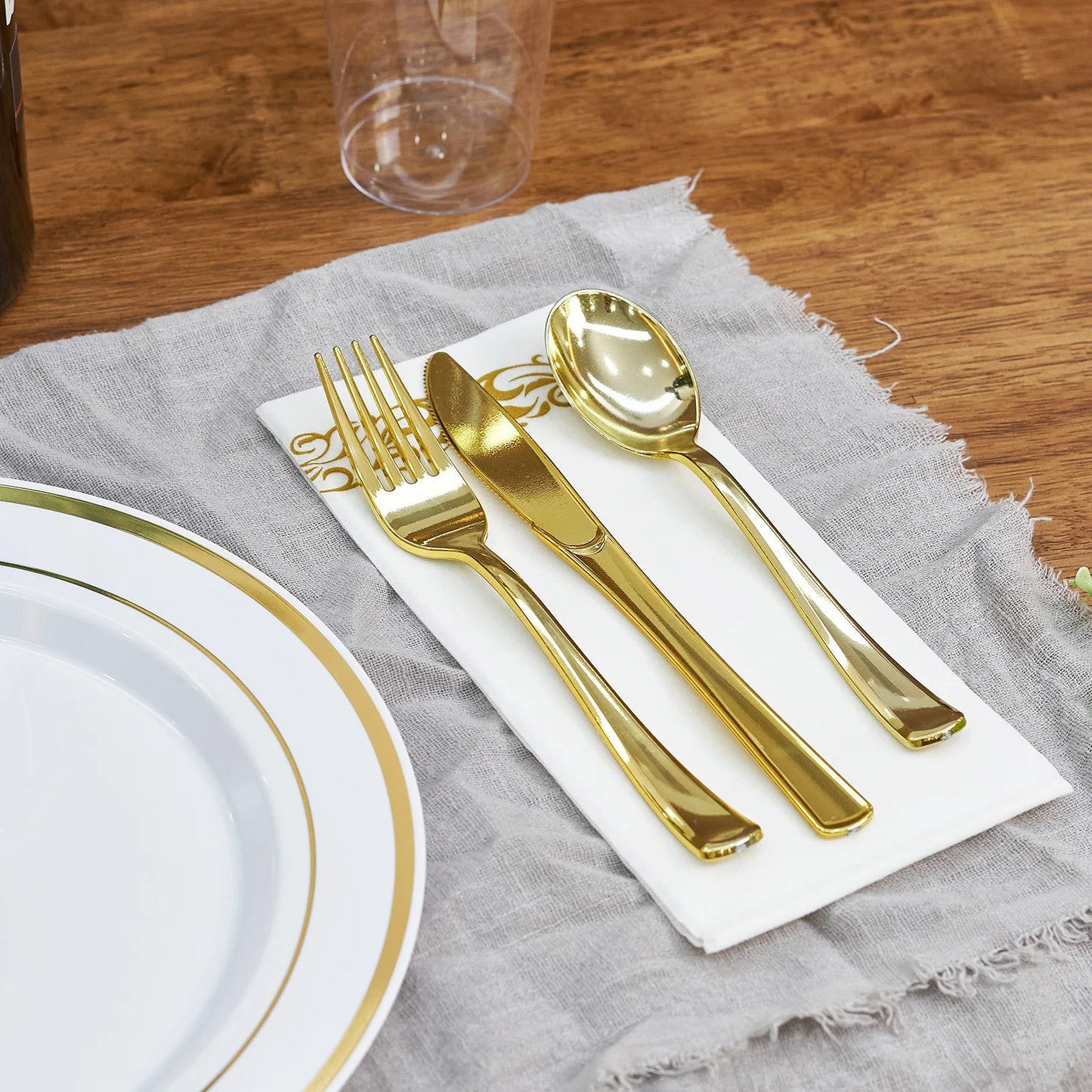 700 Pcs Gold Plastic Plates for 100 Guests - Party Supplies Includes 200 Gold Plastic Plates,300 Silverware,100 Napkins,100 Cups