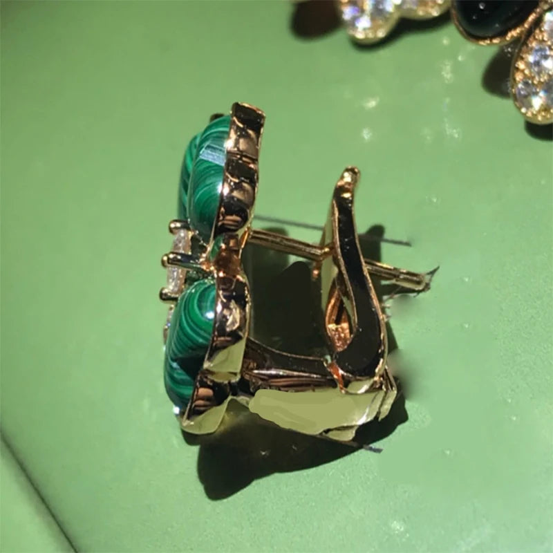 2025 New Full Drill Flash Earbone Nails Titanium Steel Ear Holes Sleeping Free Four-leaf Flower Earrings Women's New Models