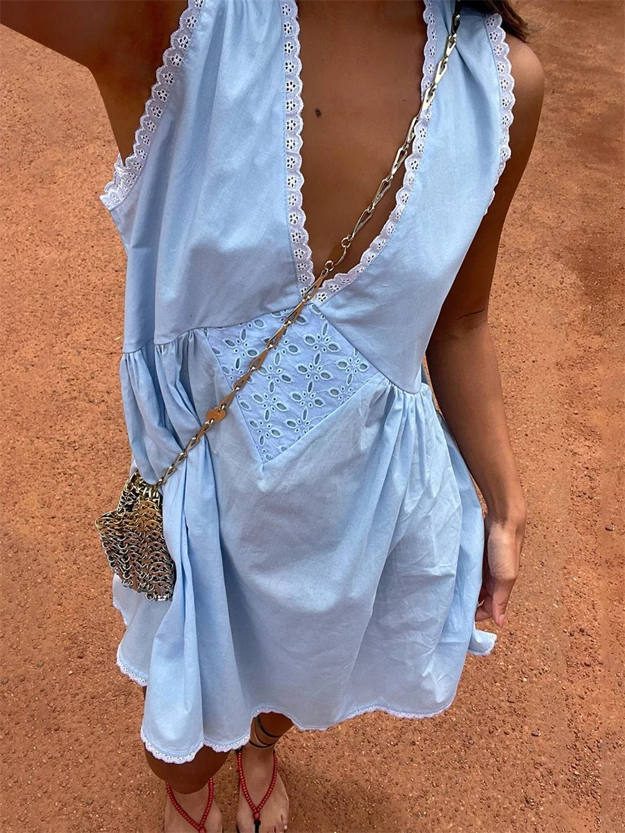 Women s Sleeveless Floral Print Mini Dress with Deep V Neckline and Eyelet Detailing - Perfect for Summer Beach Days