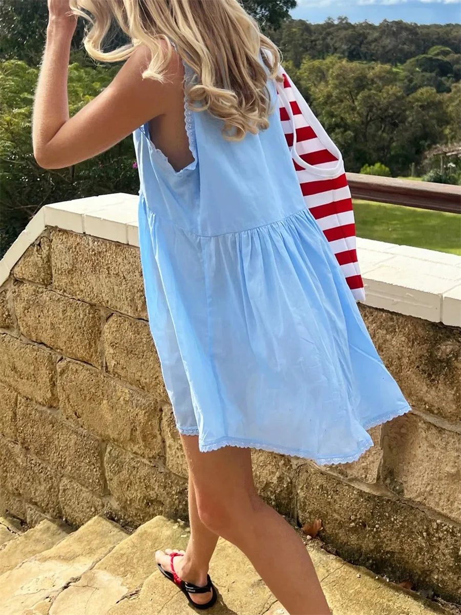 Women s Sleeveless Floral Print Mini Dress with Deep V Neckline and Eyelet Detailing - Perfect for Summer Beach Days